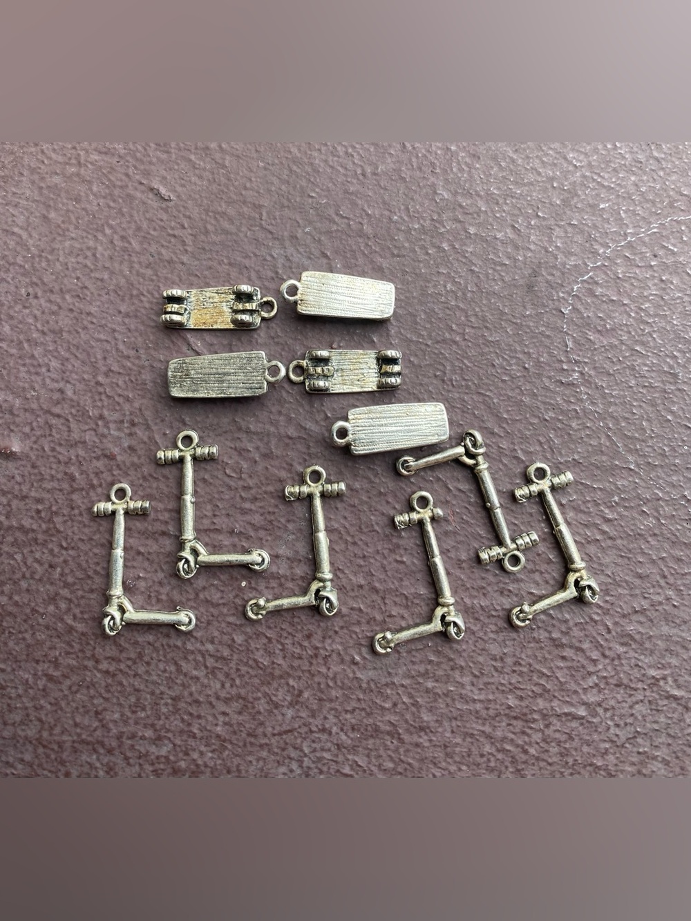 11 Piece Silver-Tone Scooter & Skateboard Charm Pendants (exact items pictured)